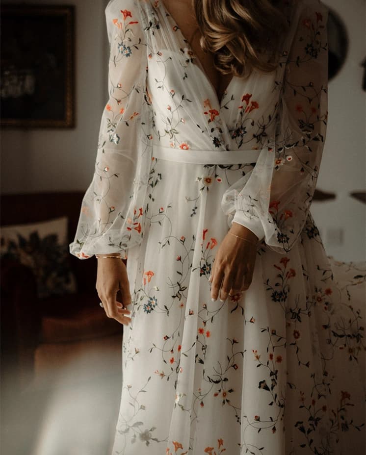 Sassi Holford Iris wedding gown with embroidered flowers