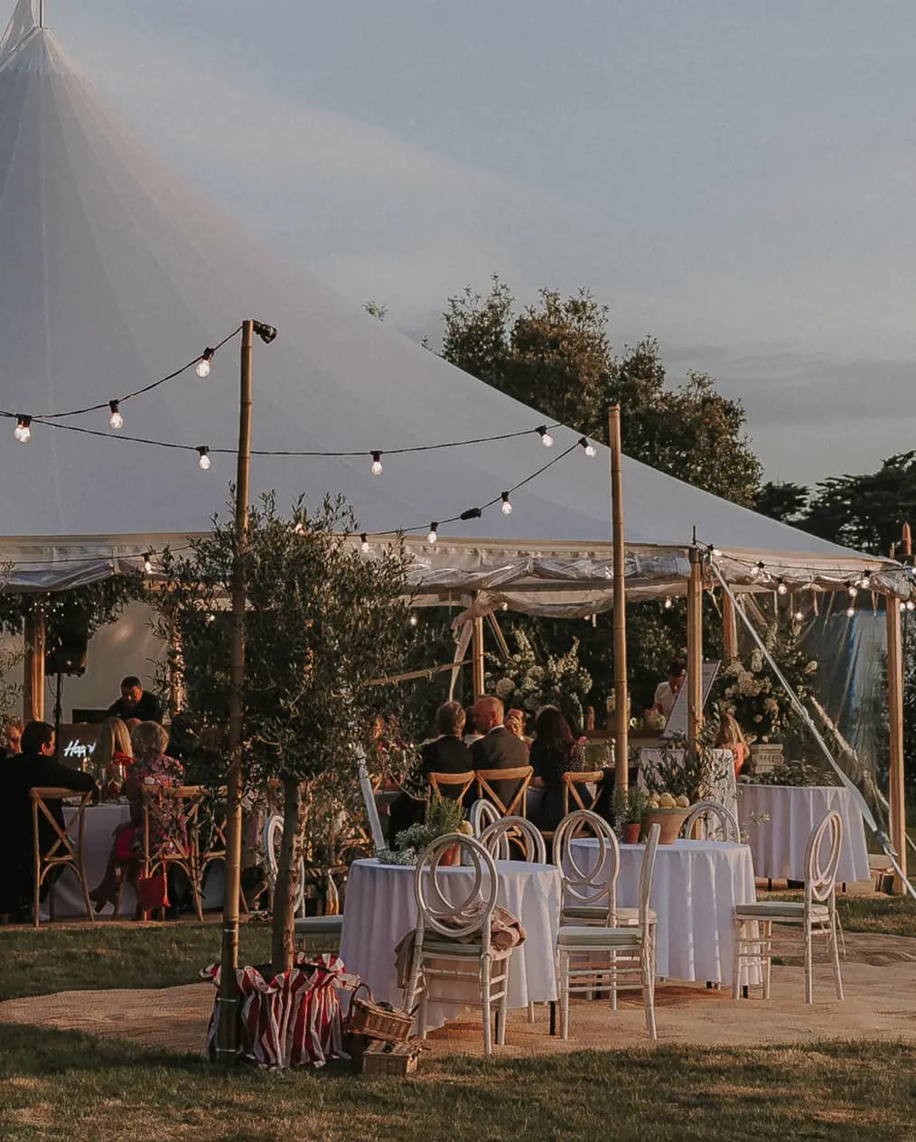 A Tuscan-inspired wedding in traditional English marquee wedding venue