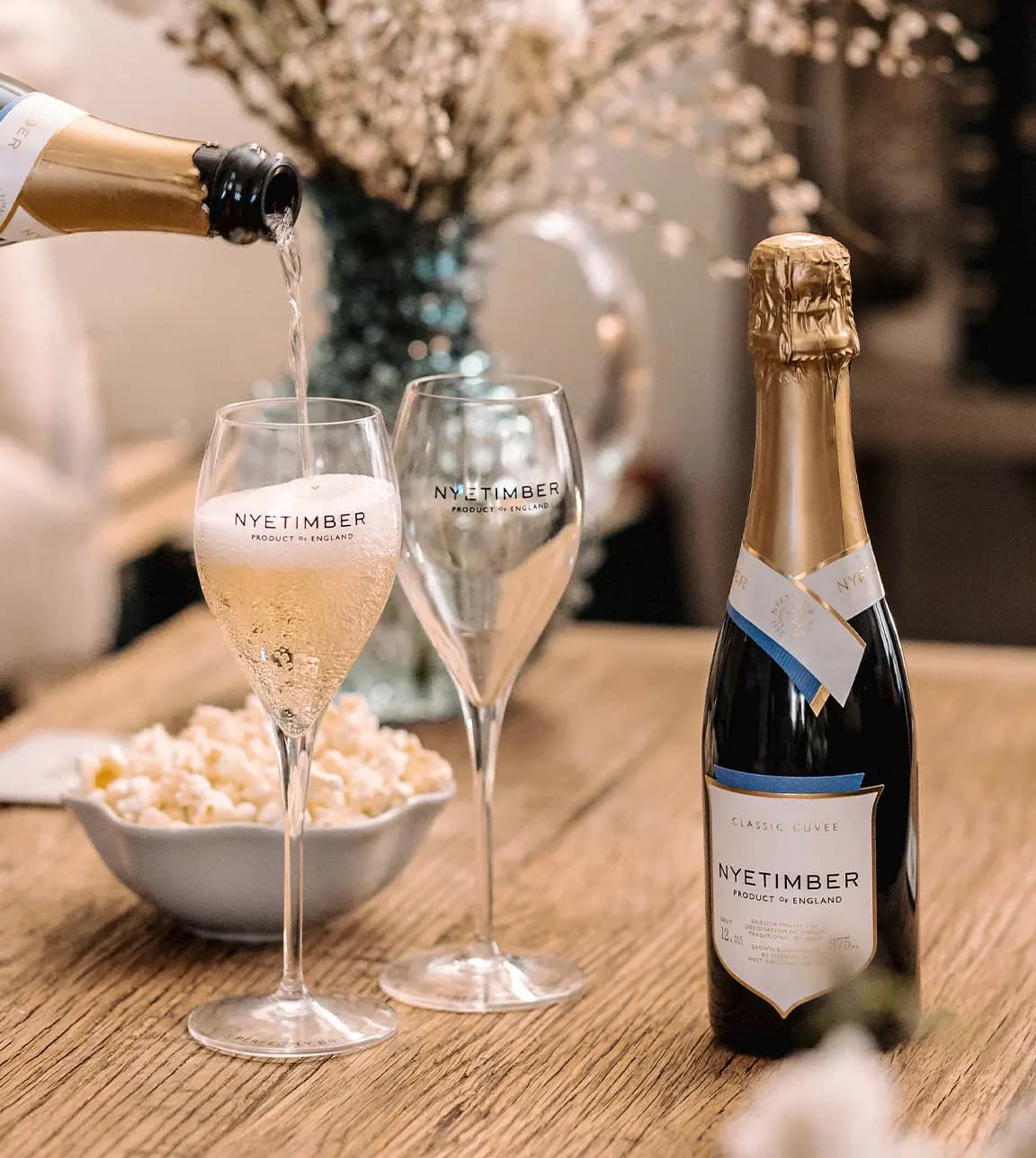 Champagne flutes with complimentary Nyetimber English sparkling wine in the Wedding Present Company Showroom