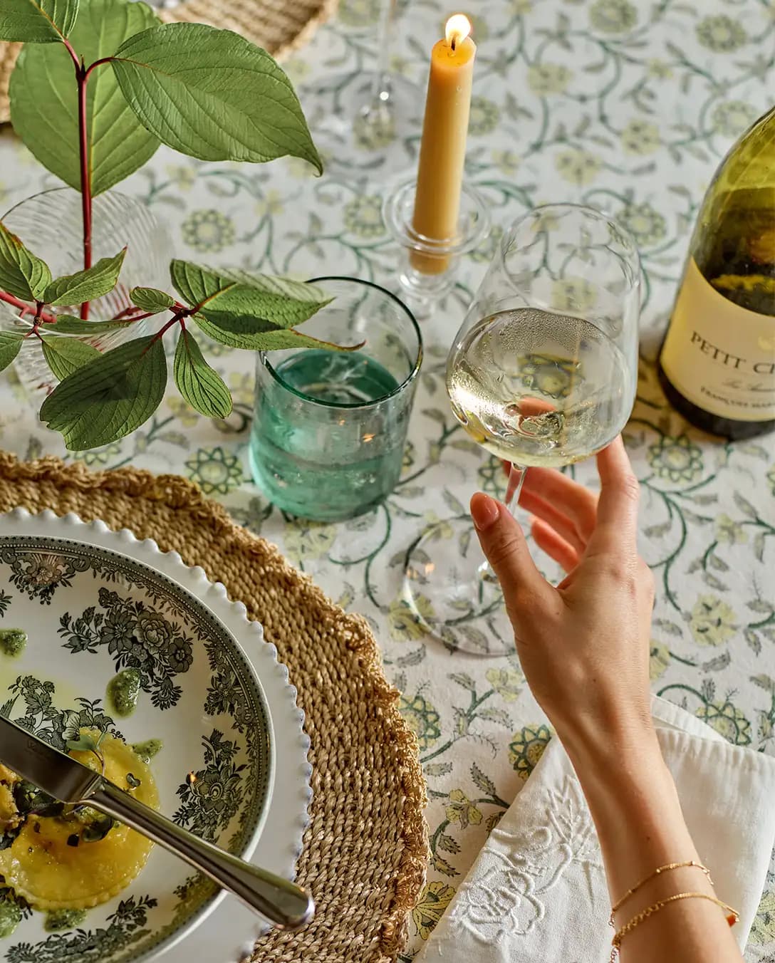 Perfect white wine glass paired with stylish green tableware and gifts