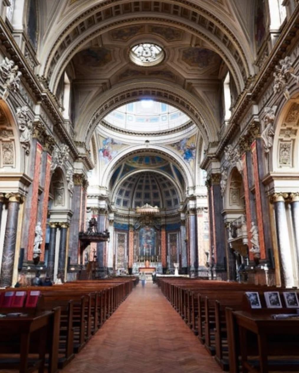 The grand wedding venue at Catholic church Bromptom Oratory with view of ceilings and altar