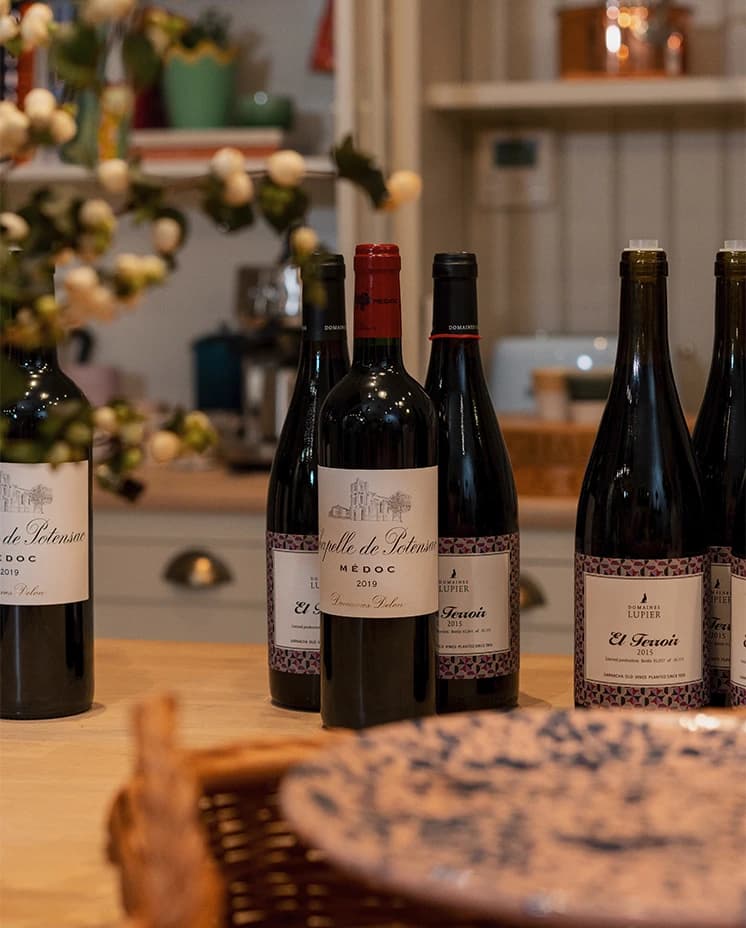 Marlo Wine bottles arranged on the kitchen counter in The Wedding Present Company showroom