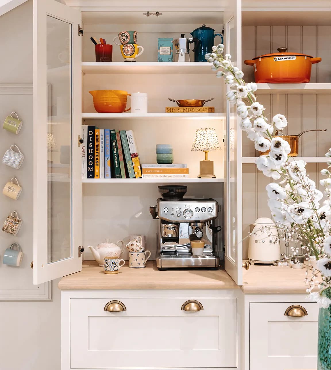 A cabinet in the Wedding Present Company Showroom features luxury kitchenware presents