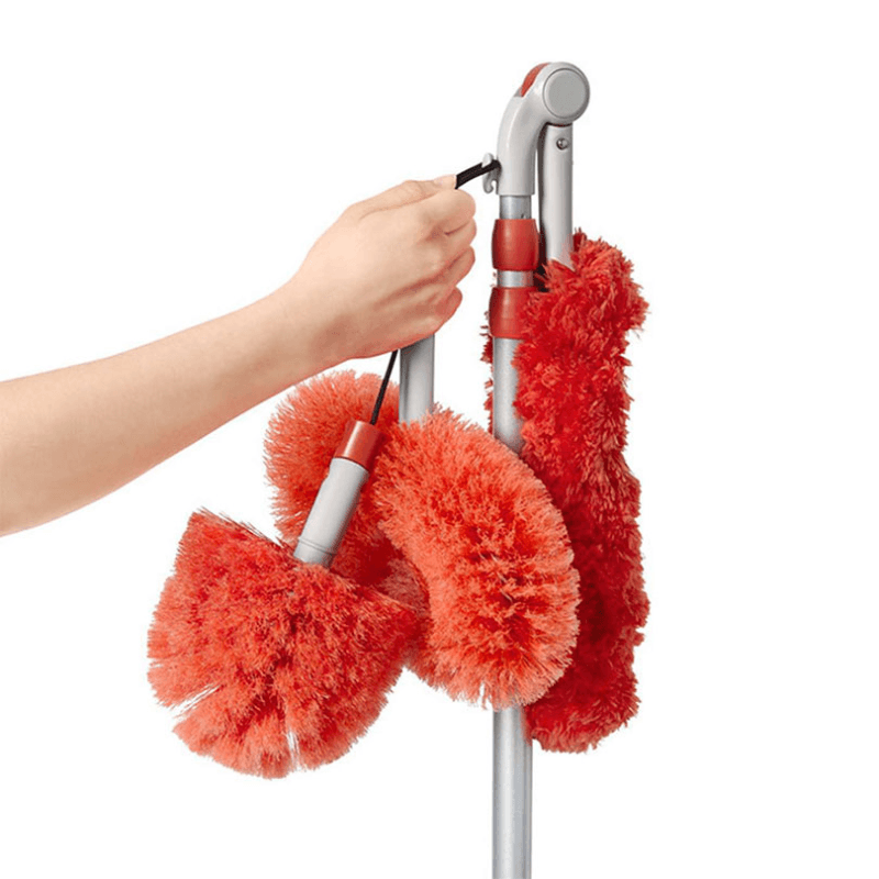 Long reach duster system with pivoting heads