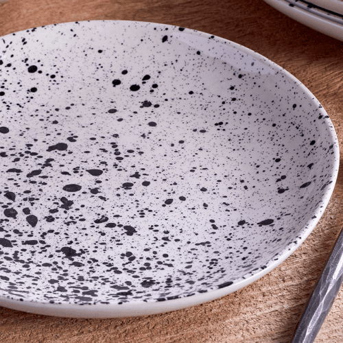 Image showing the Ama Splatter Dinnerware Set, White & Black product.