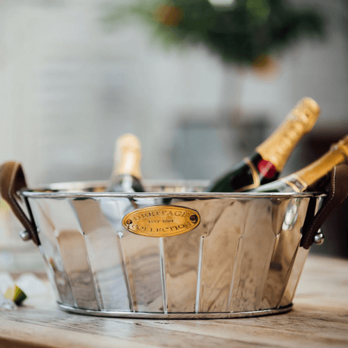 Image showing the Heritage Champagne bath with leather handle, 19 x 49 x 30cm, Stainless Steel, Brass And Leather product.