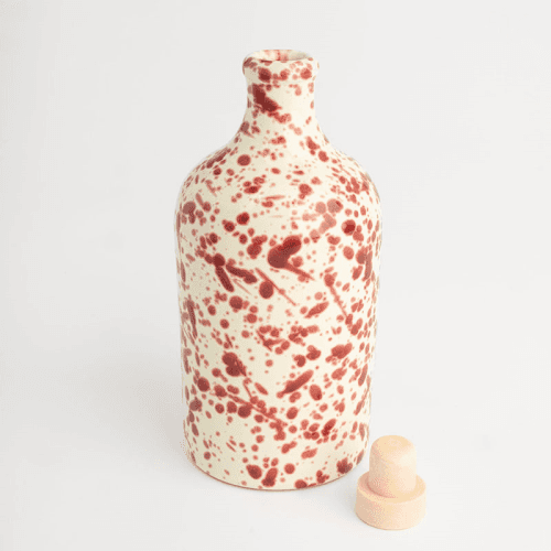 Image showing the Splatter Ceramic Bottle, 500ml, Cranberry product.