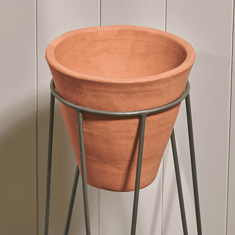 Jara Large terracotta planter with stand, D63 x 29 x 29cm, Terracotta/Black