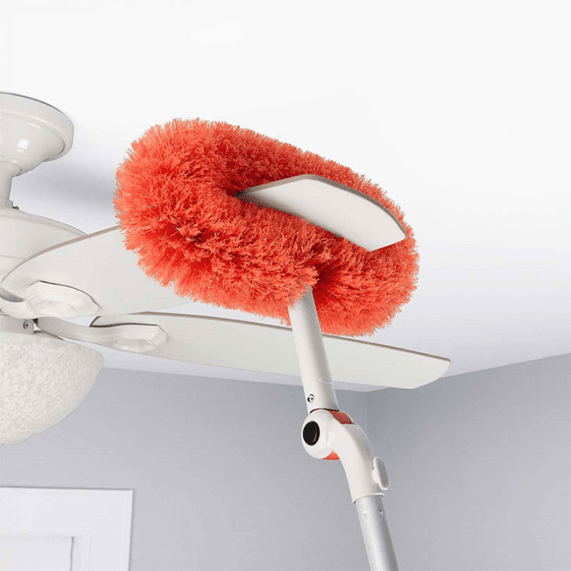 Long reach duster system with pivoting heads