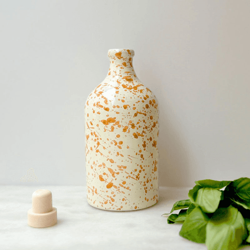 Image showing the Splatter Ceramic Bottle, 500ml, Burnt Orange product.