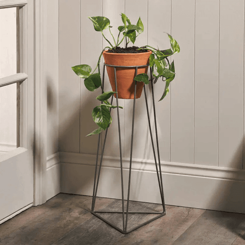 Image showing the Jara Large terracotta planter with stand, D63 x 29 x 29cm, Terracotta/Black product.