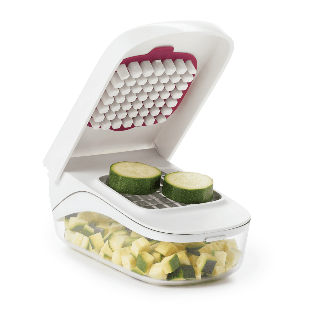 Vegetable chopper with easy pour opening
