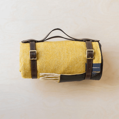 Image showing the Herringbone Recycled Wool Picnic Blanket with Brown Leather Carrier, 140 x 190cm, Mustard product.