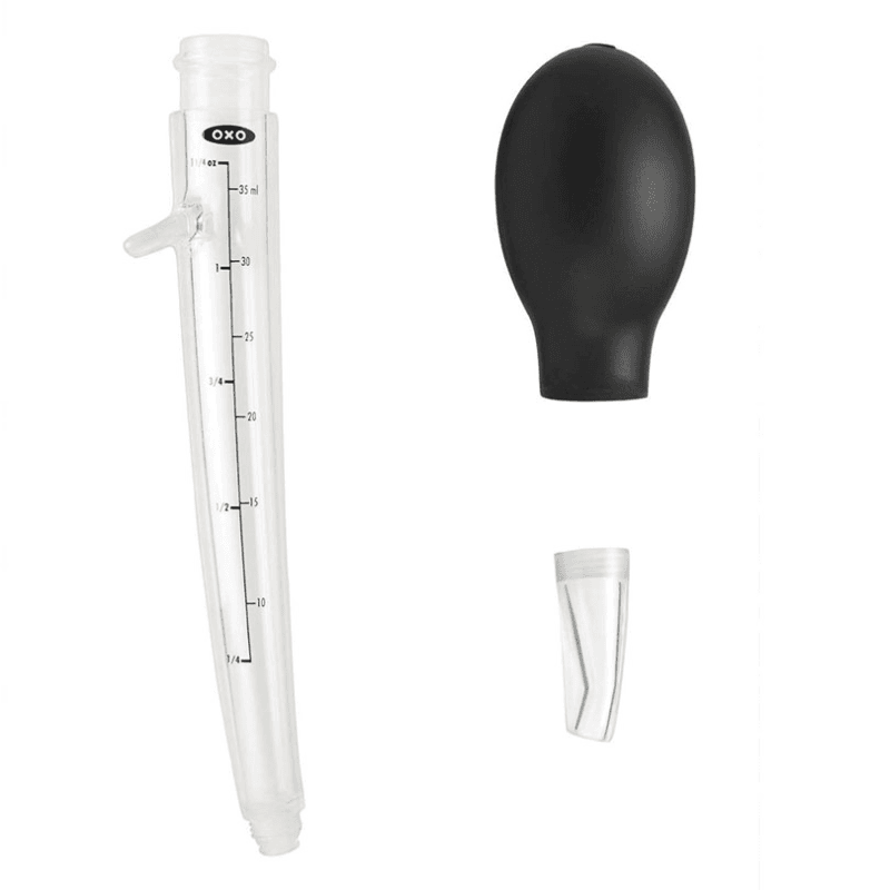Angled baster with cleaning brush