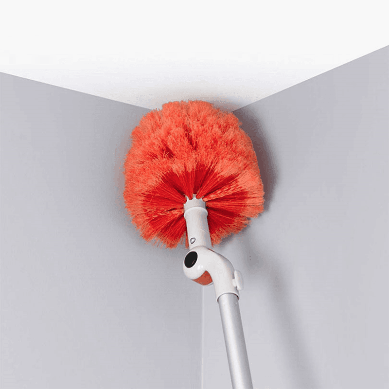 Long reach duster system with pivoting heads