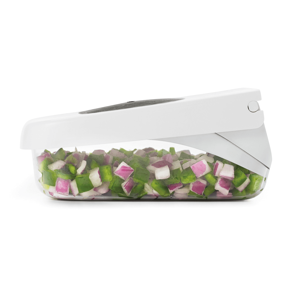 Vegetable chopper with easy pour opening