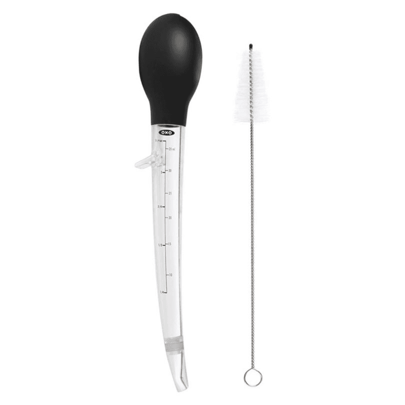 Angled baster with cleaning brush