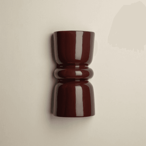 Image showing the Redonda Up & Down Ceramic Wall Light product.