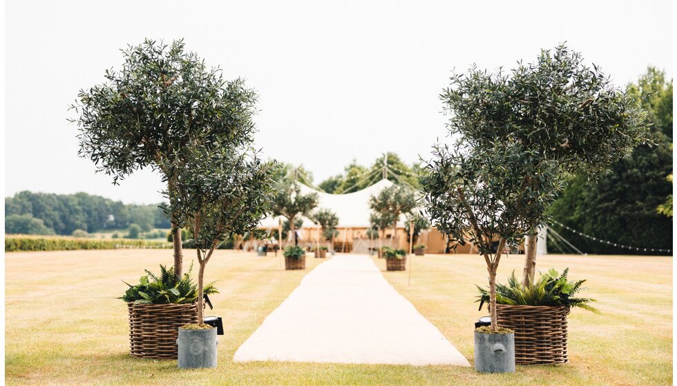 Whimsical Tuscan-Inspired Wedding in Hampshire | Tuscan-inspired wedding marquee by Sail & Peg in the middle of a beautiful garden in Hampshire