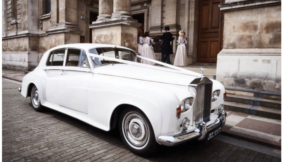 The couple's wedding car was a 1930’s silver Rolls Royce