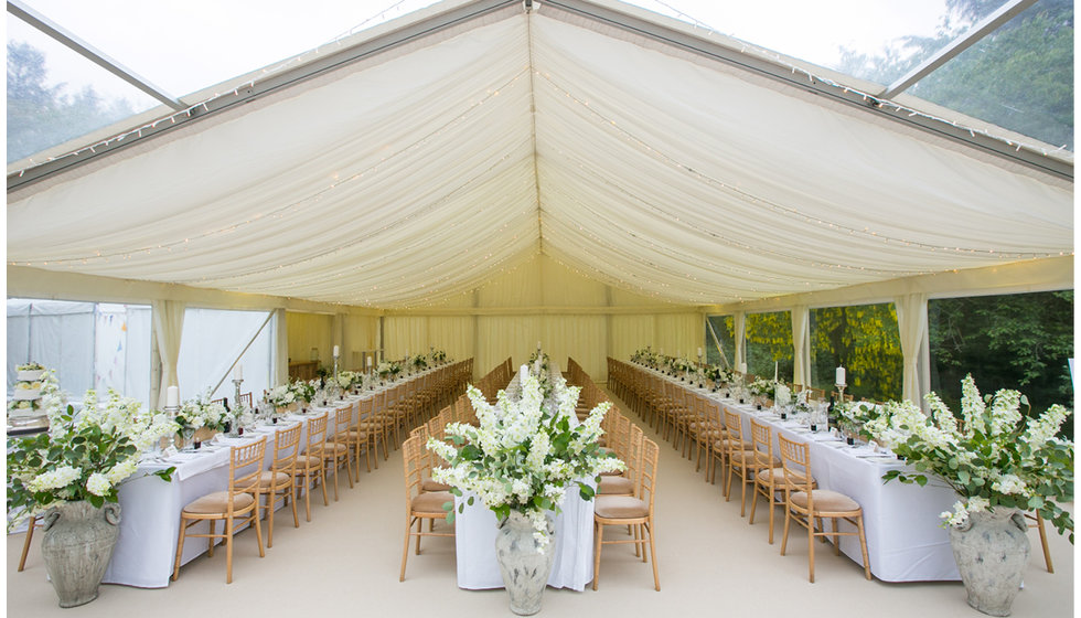 The inside of the marquees with a green and white colour pallette. 