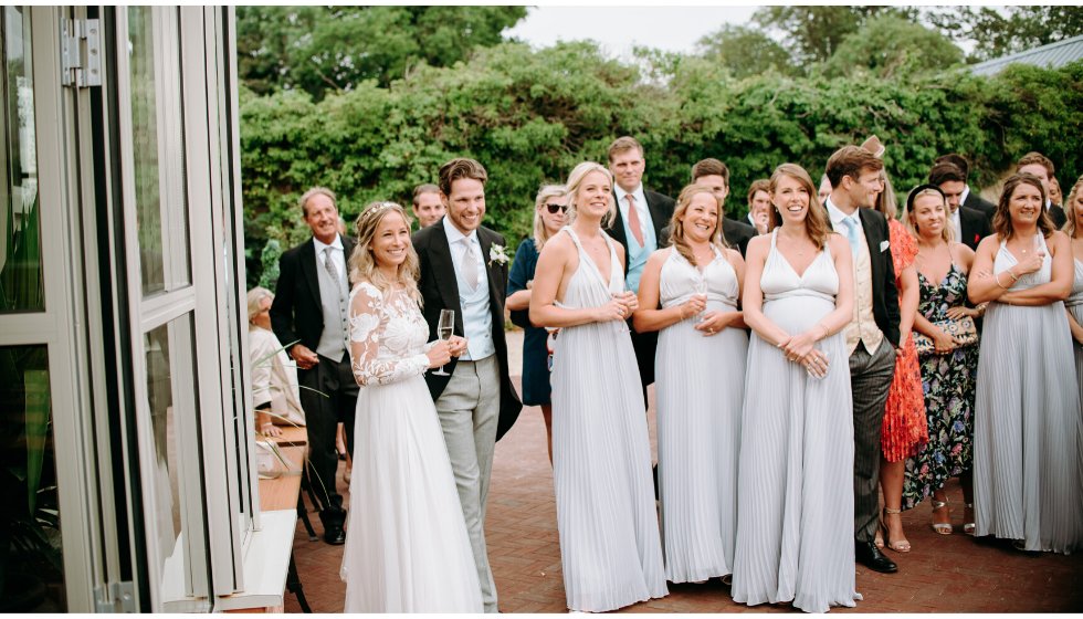 Poppy, Freddie and the bridesmaids during the father of the bride speech