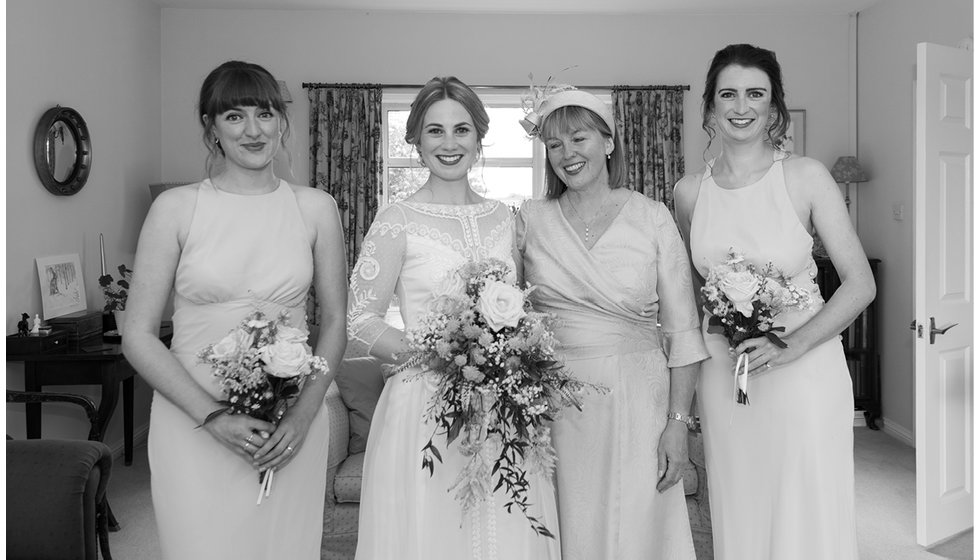 The bride, her bridesmaids and her mother.