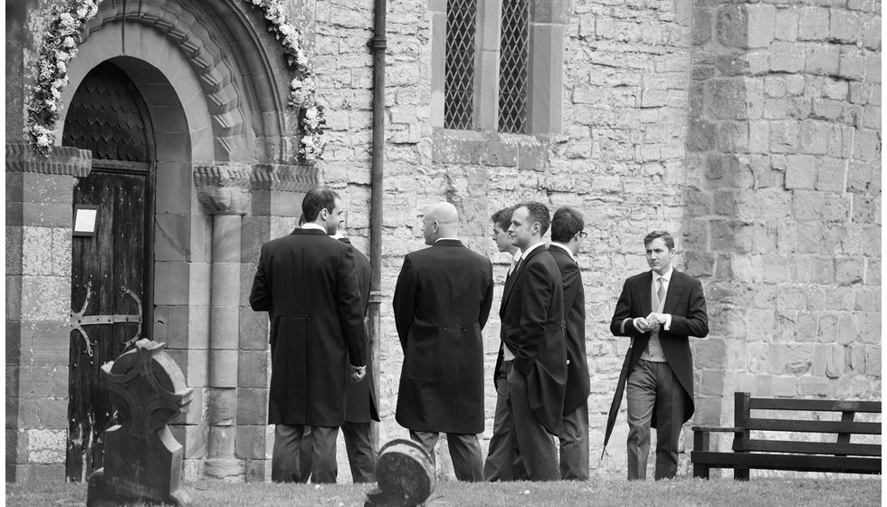 The ushers outside the Church.