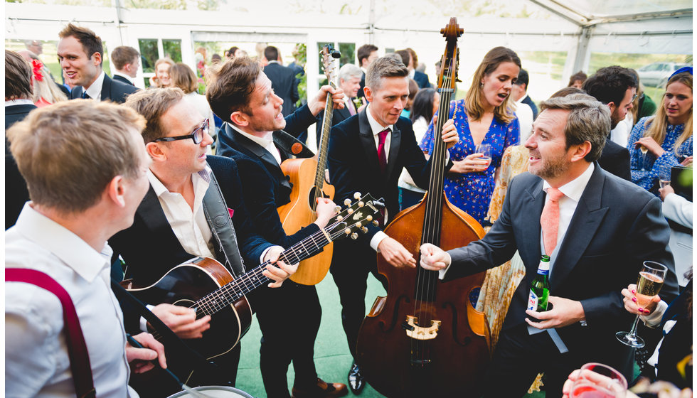 The diamond boys performing to the guests in the marquee during the reception.