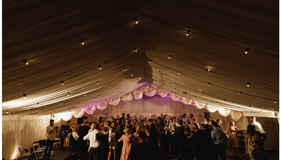 The guests all dancing at night.