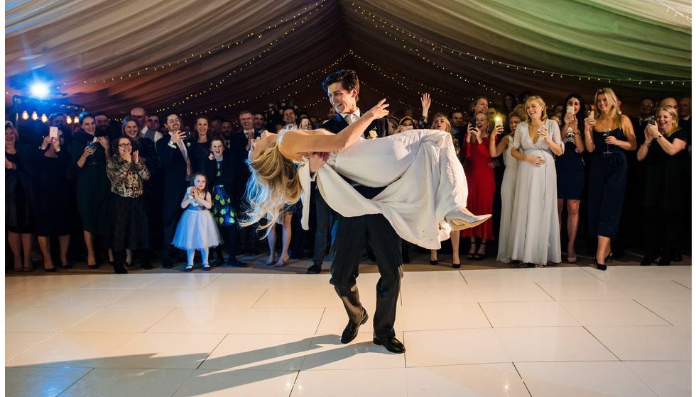 The bride and groom dancing on the dancefloor.