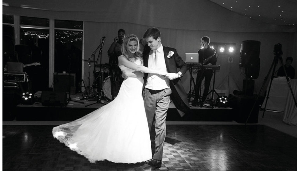 The bride and groom doing their first dance. 
