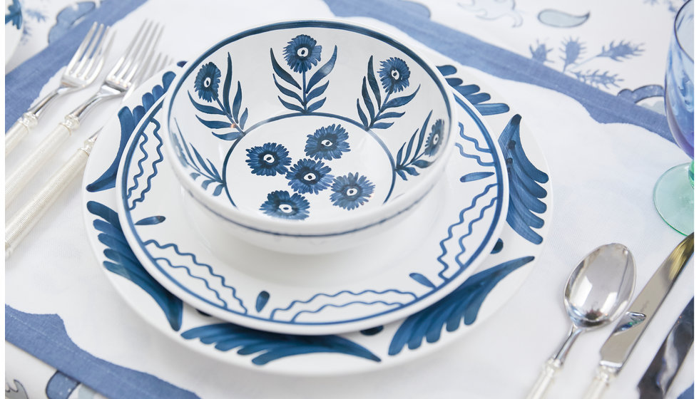 A close up of Penny Morrison tableware printed in a floral design.