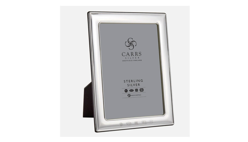 A silver plated Carrs photo frame.