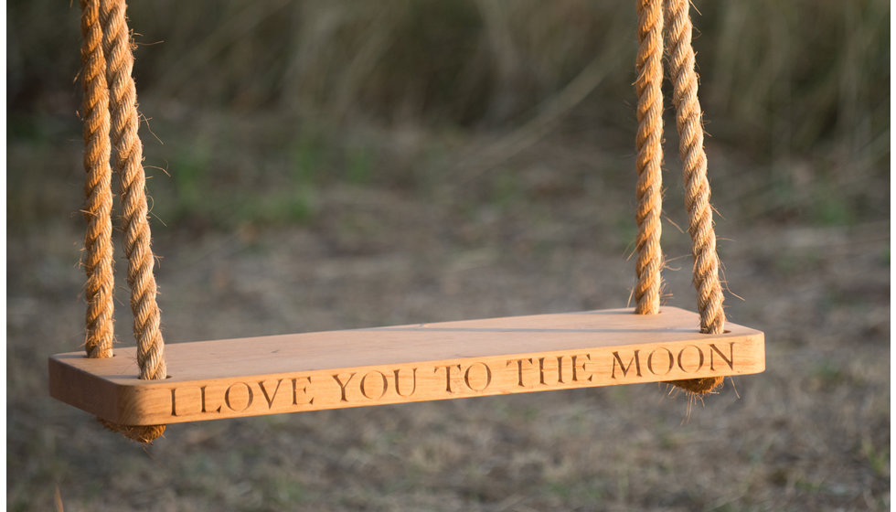 A personalised engraved Oak and rope swing.
