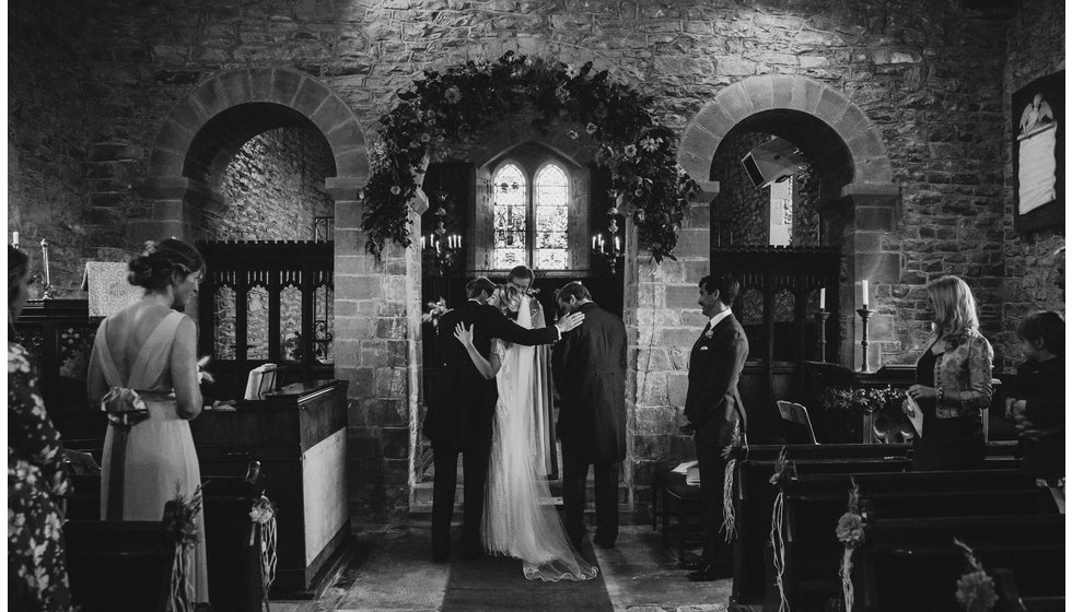 The bride and groom in the church.