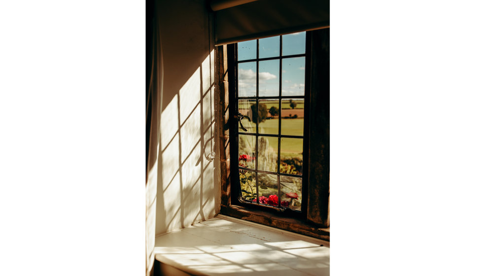 A window looking out onto the Herefordshire countryside where the couple got married.