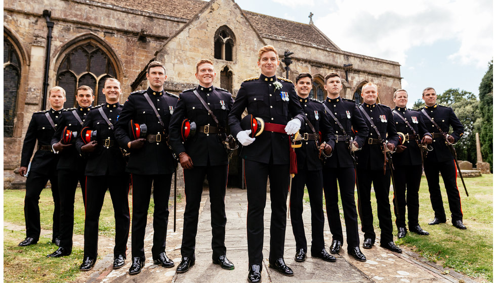 The groom and his groomsmen in military uniform. 
