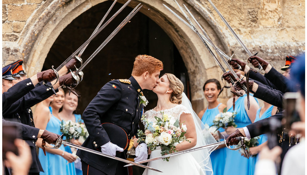 Charlotte and Matt and their military wedding.