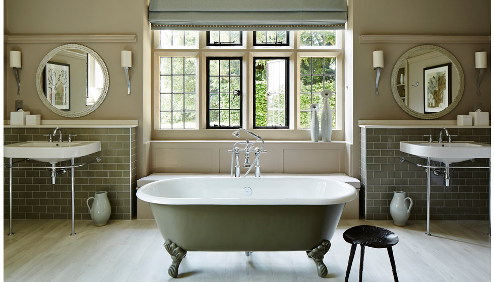 One of the luxury bathrooms in the Foxhill Manor Hotel with a large roll top bath, and twin sinks. 