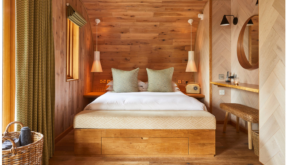 A cabin bedroom in the luxury boutique hotel The Fish.
