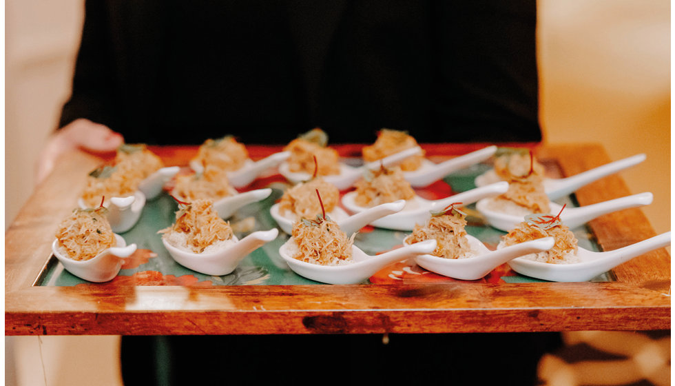Canapés served in individual spoons.