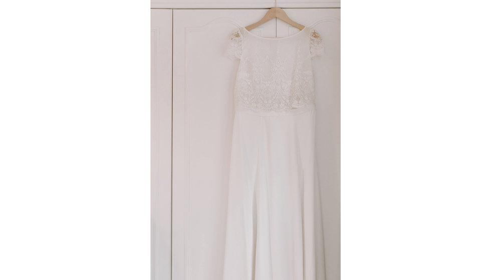 Sarah's wedding dress from Laure de Sagazan with short sleeves and lace detailing. 