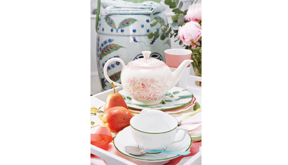A tea cup and sacer, and a Burleigh pink teapot styled by Emily Henson.