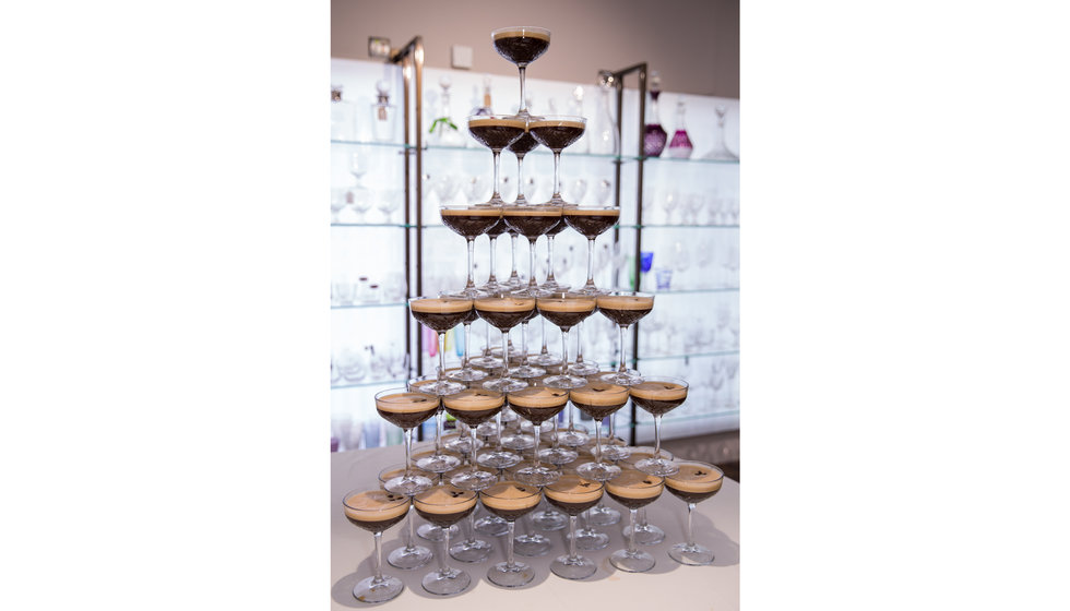 An espresso martini tower in coupe glasses in The Wedding Present Company showroom.