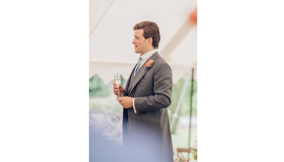 Groom Jack, on his wedding day doing his grooms speech in his small marquee at his intimate wedding,