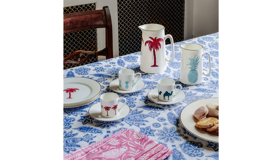A breakfast table laid with an Alice Peto milk jug, espresso cups and starter plates.