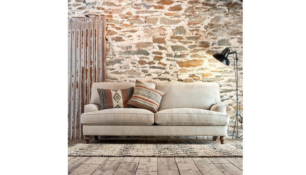 A beige Nkuku sofa made from sustainable materials and made to last.