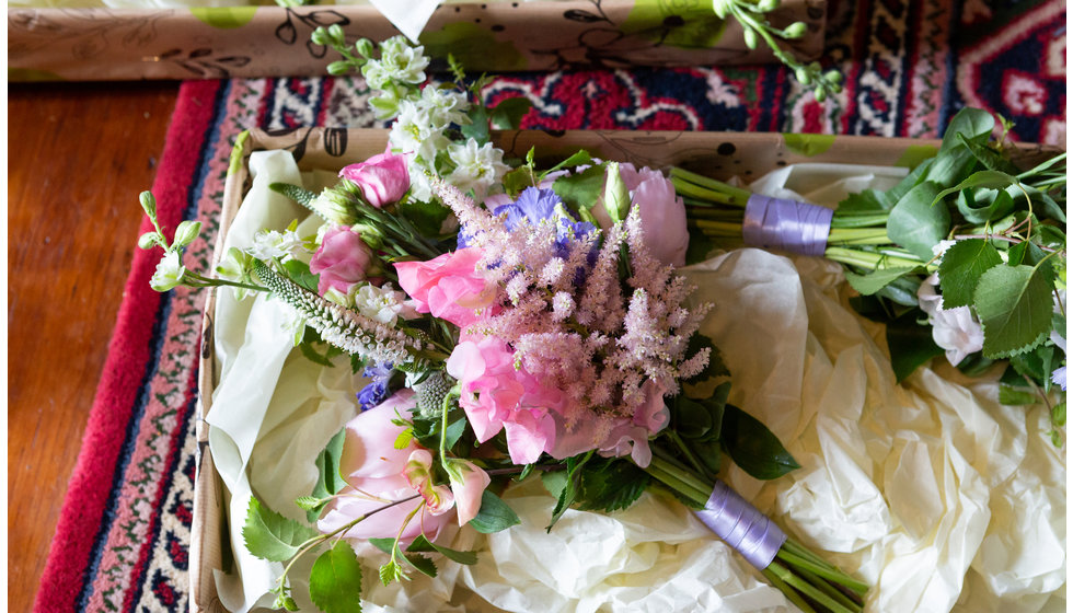 Sarah's wild and romantic bouquet of flowers made up of an array of pink flowers and foliage.