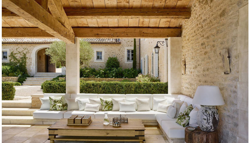 An outdoor seating area at a chateau in Provence. 